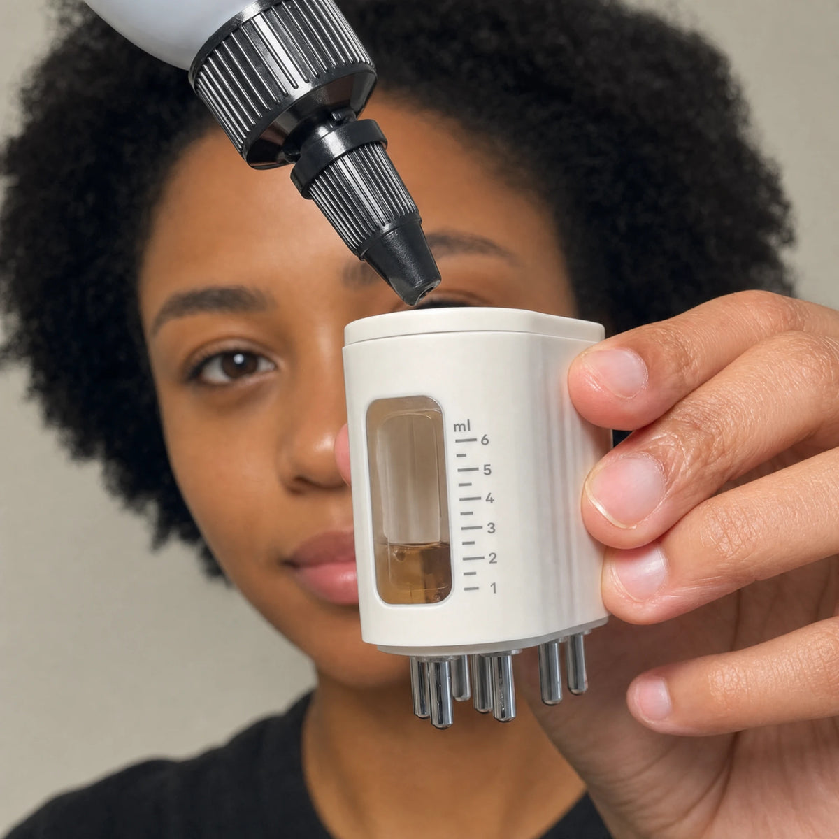 Filling the Follicle Activator with Chebe Hair Growth Oil